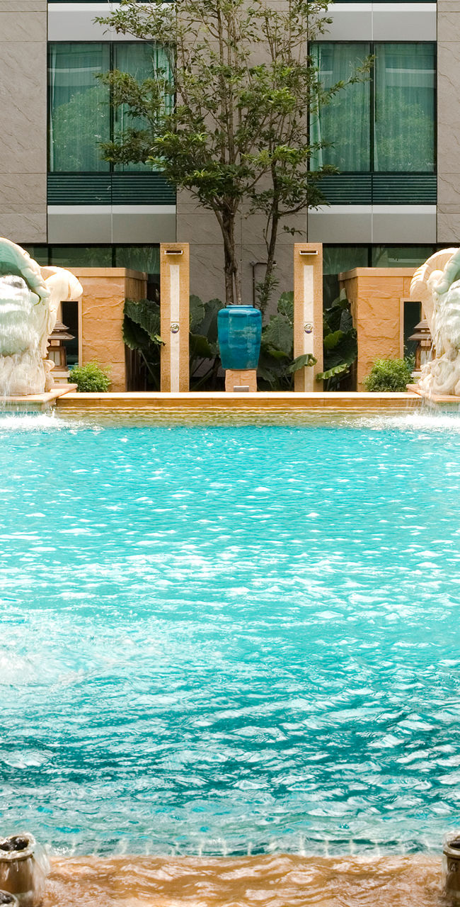 Luxury hotel pool with fountains