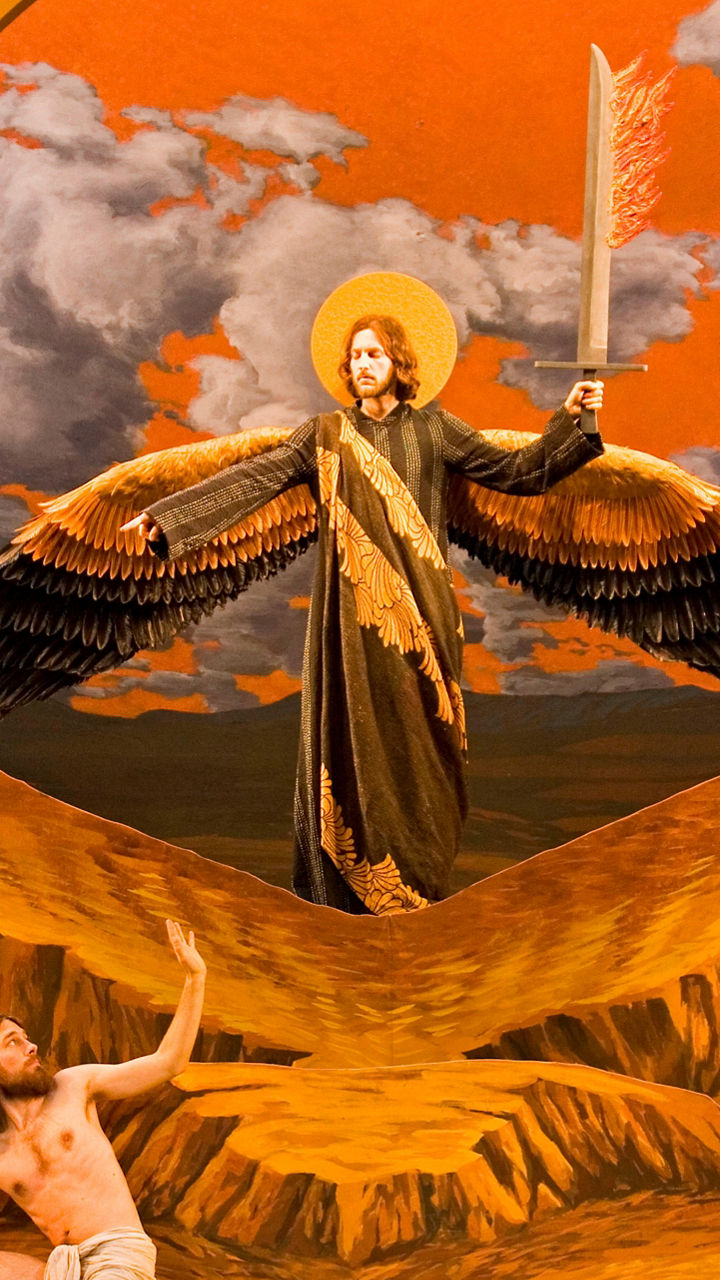 Dramatic angelic scene with golden tones