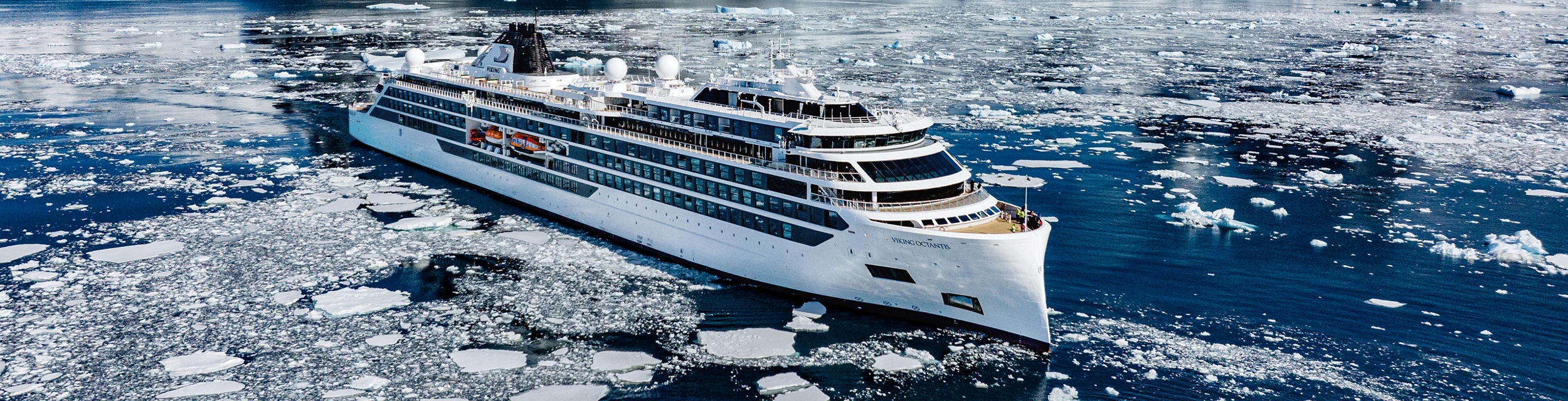 Luxury cruise ship in icy Antarctic waters