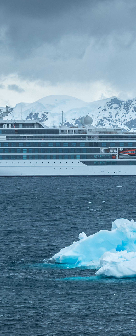 Luxury cruise ship in icy Antarctic waters