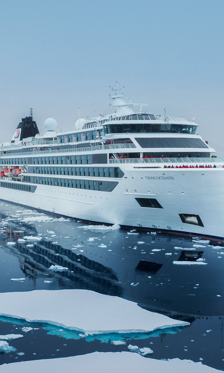 Luxury cruise ship in icy Arctic waters