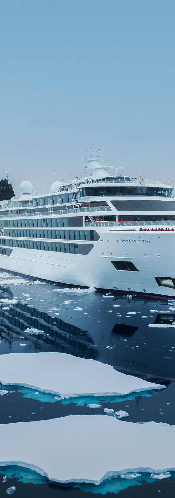 Luxury cruise ship in icy Arctic waters