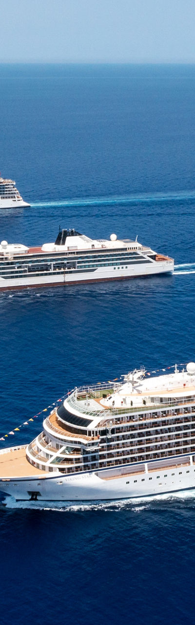 Luxury cruise ships sailing in open sea