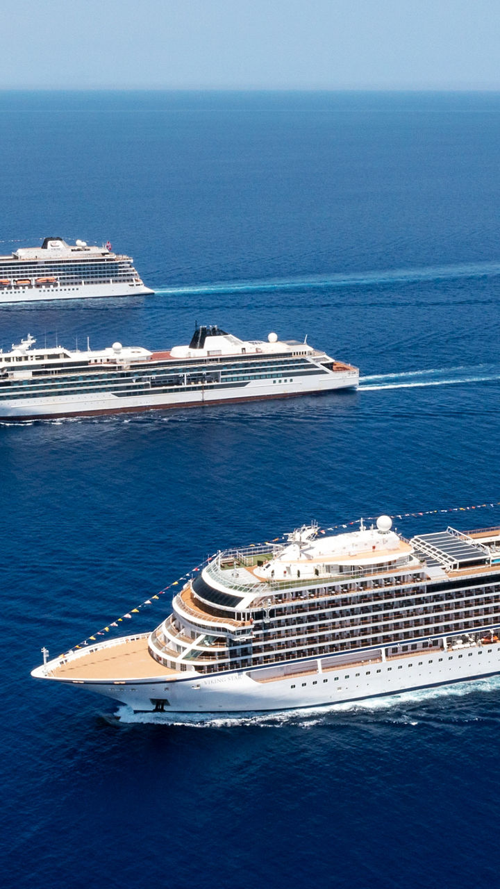 Luxury cruise ships sailing in open sea