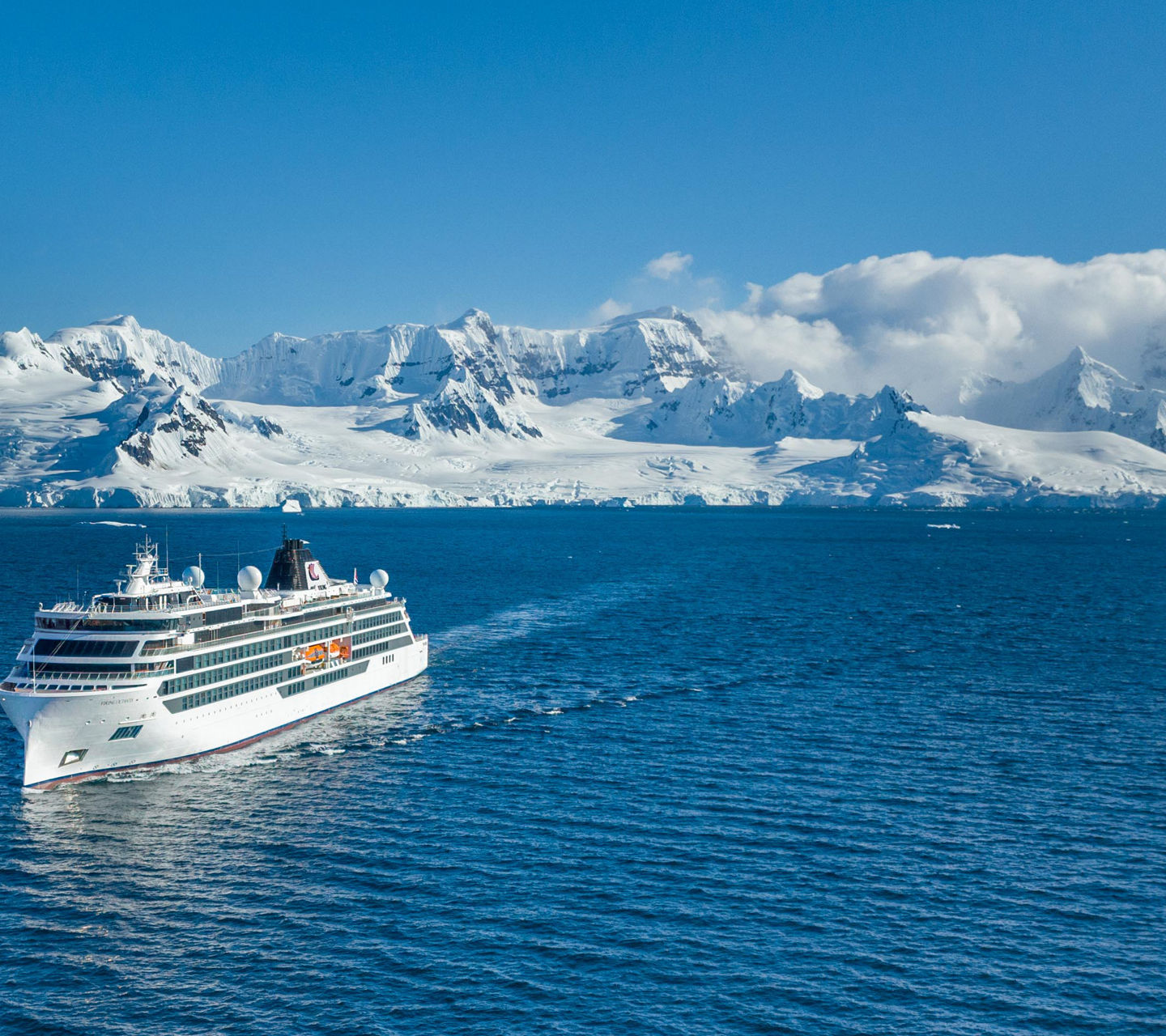 Cruise ship sailing in icy Antarctic waters