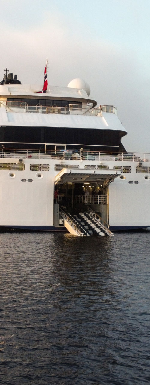 Luxury cruise ship with tender boat