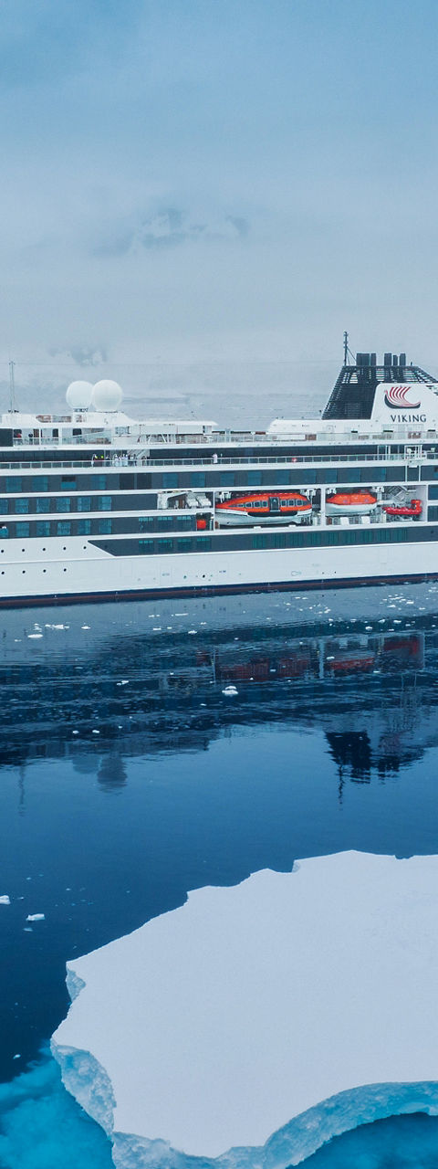 Luxury cruise ship in icy Arctic waters