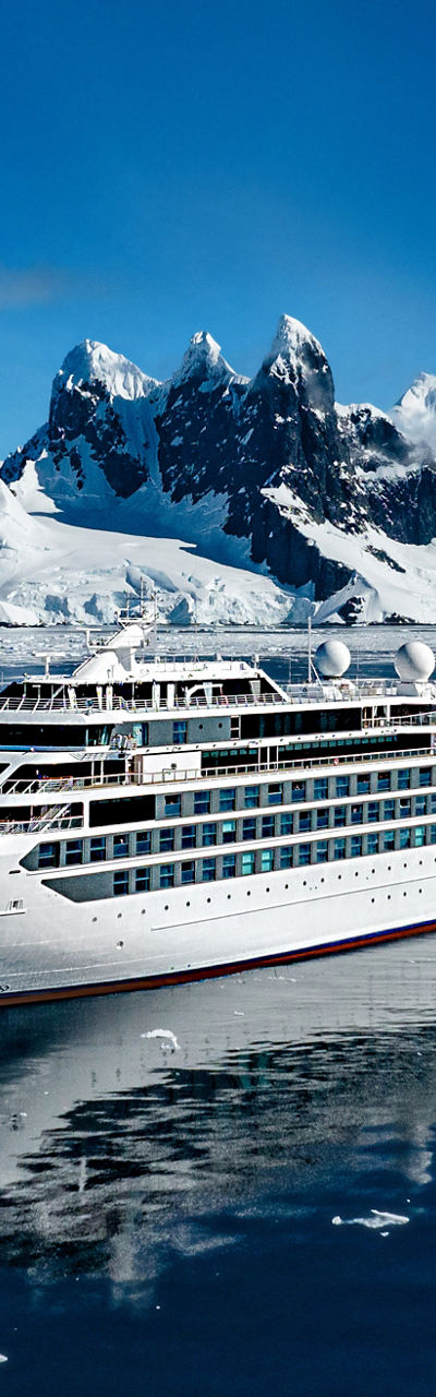 Luxury cruise ship in icy Antarctic waters