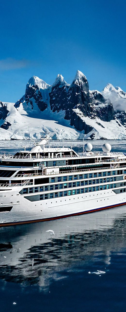 Luxury cruise ship in icy Antarctic waters