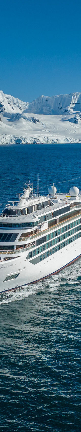 Luxury cruise ship in icy Antarctic waters