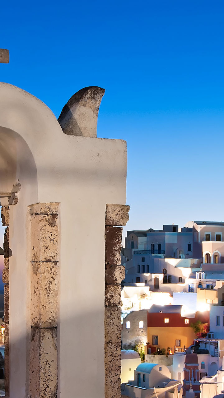 Santorini bell tower at sunset