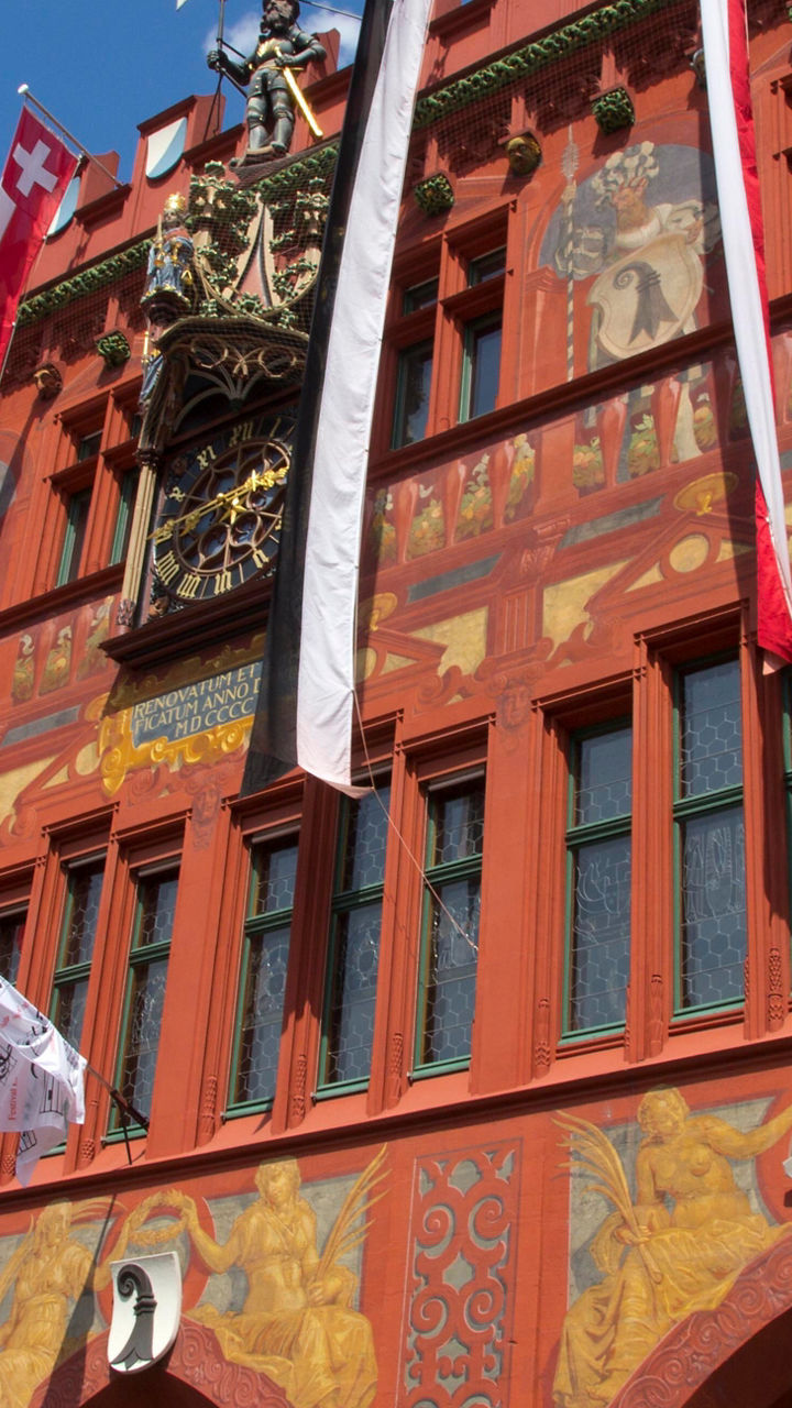 Historic red building with decorative facade