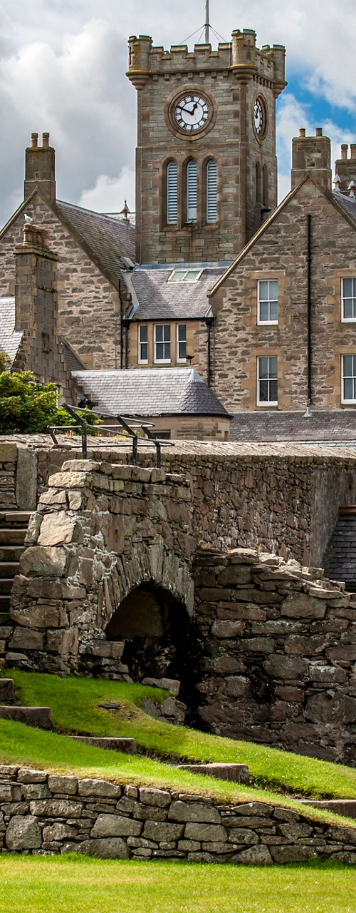 Historic stone building with clock tower