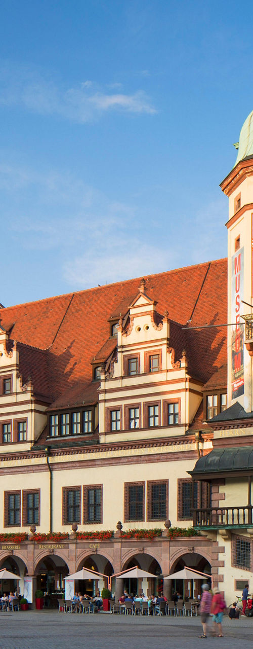 Historic Leipzig building with clock tower