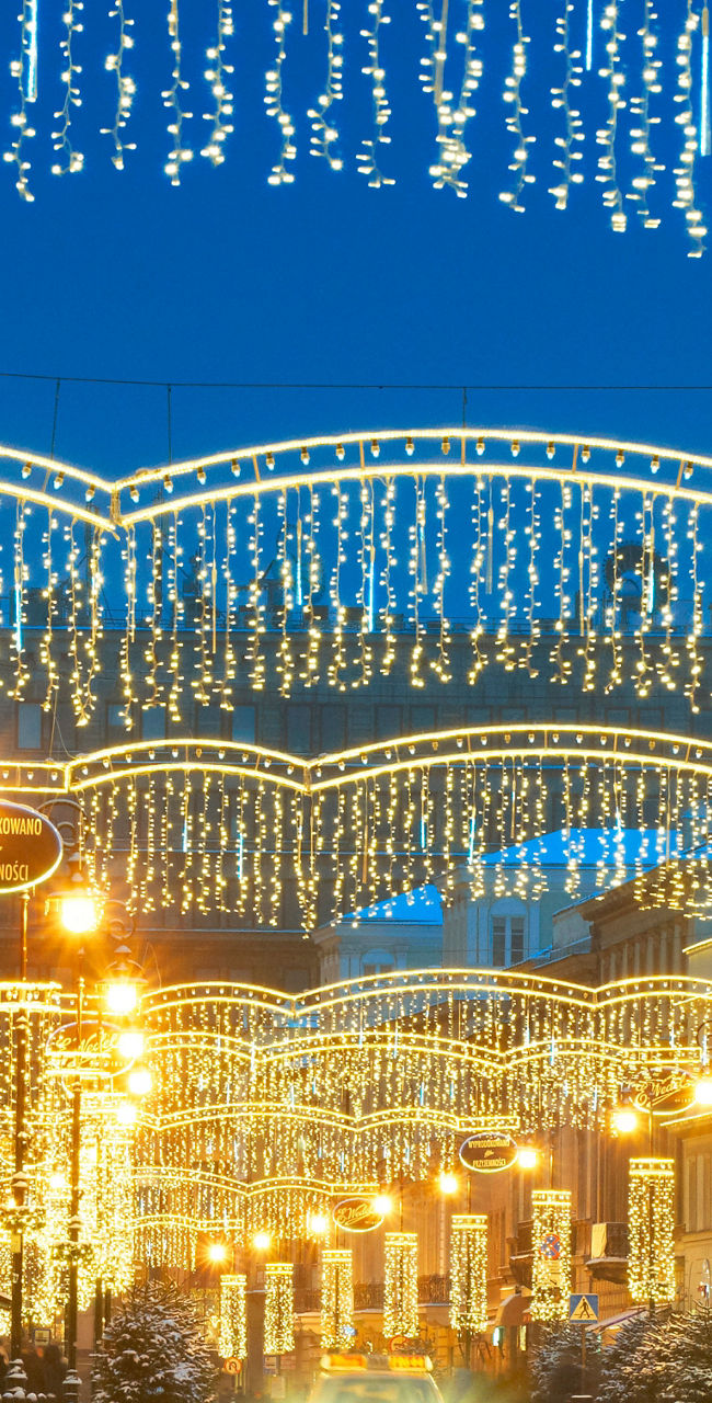 Festive street with holiday lights at night