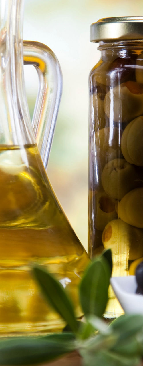 Assorted olive oils and marinated olives
