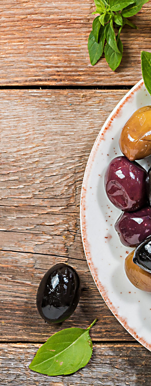 Assorted olives with bread and olive oil