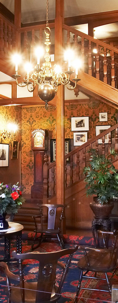 Elegant vintage interior with wooden staircase
