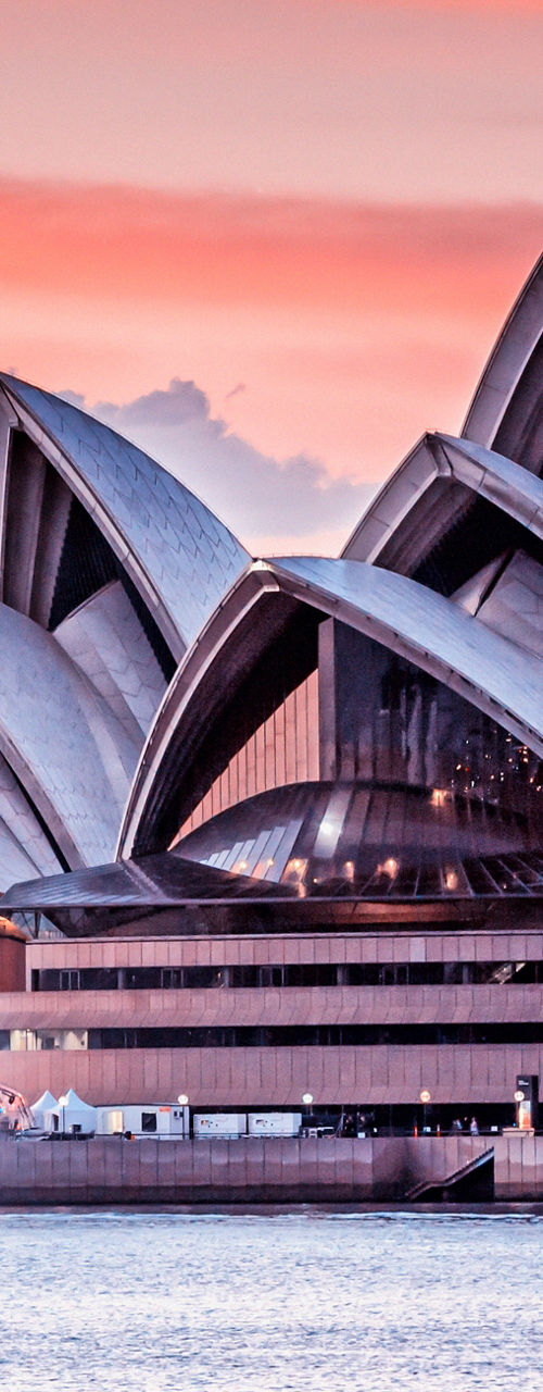 Sydney Opera House at sunset over water