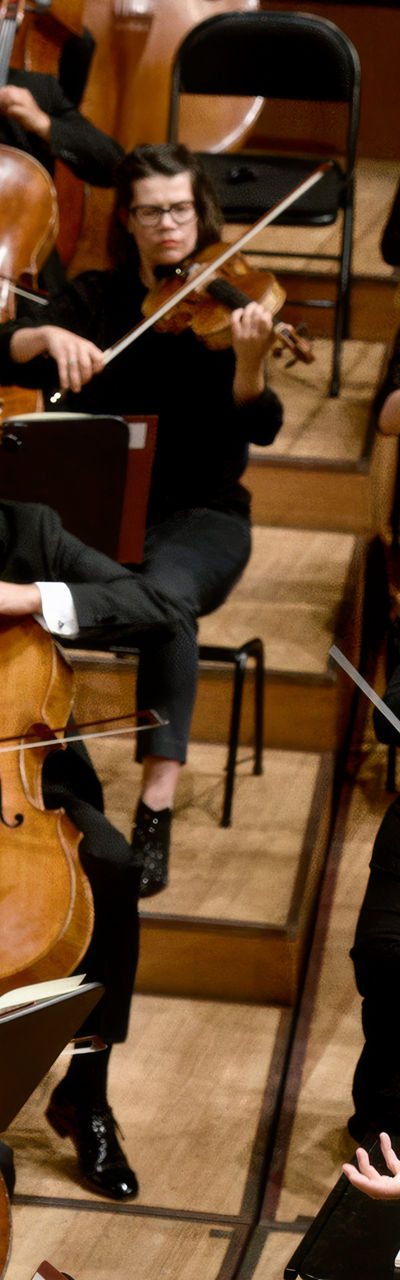 Symphony orchestra performing on stage