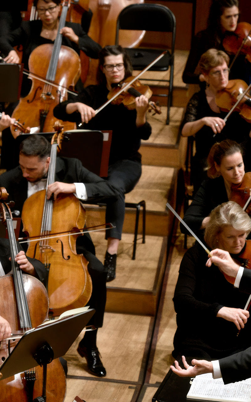 Symphony orchestra performing on stage