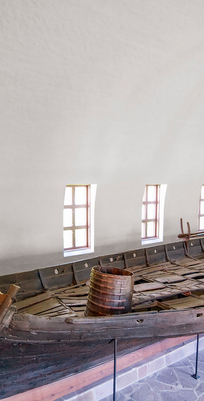 Ancient Viking ship in museum exhibit