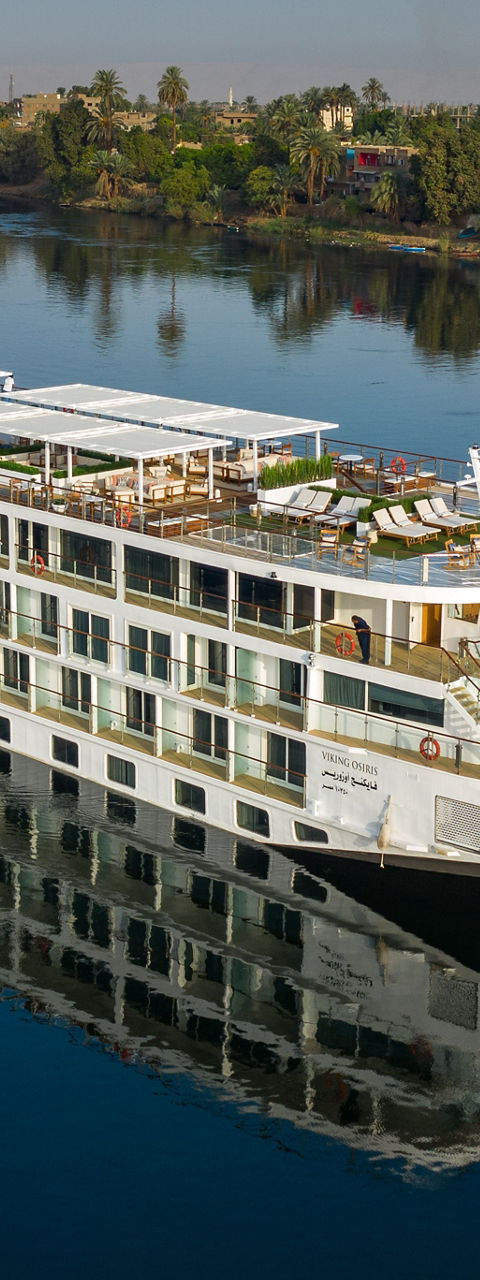 Luxury river cruise ship on calm waters