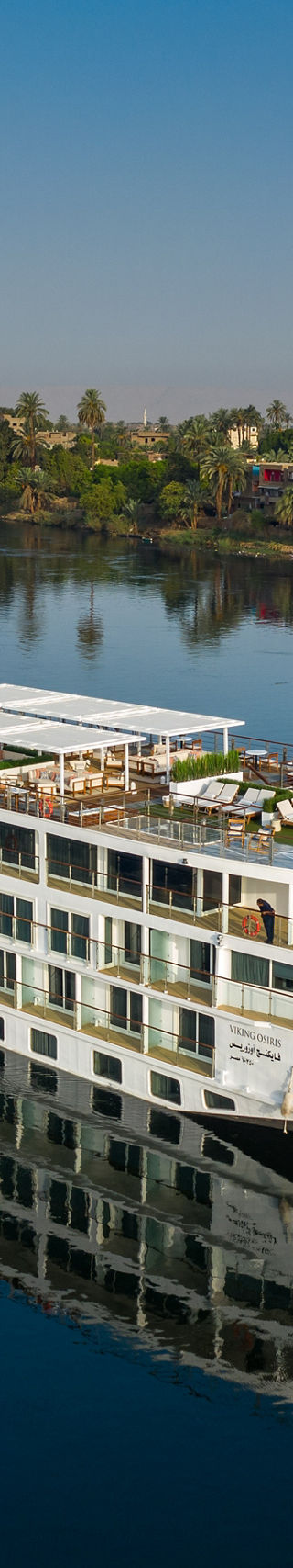 Luxury river cruise ship on calm waters