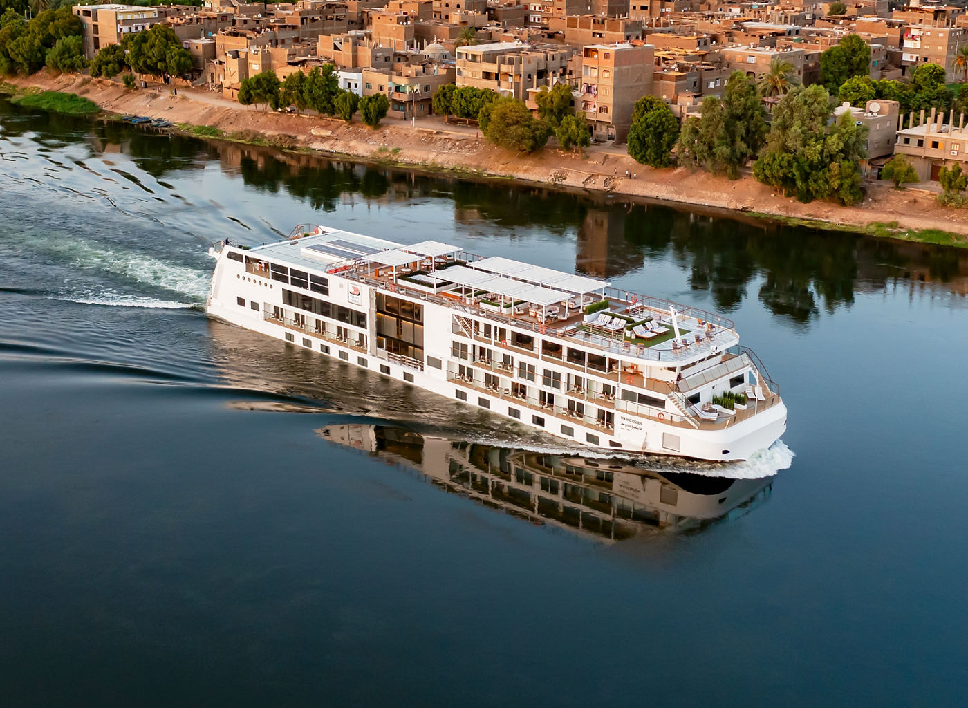 Luxury river cruise ship on calm waters