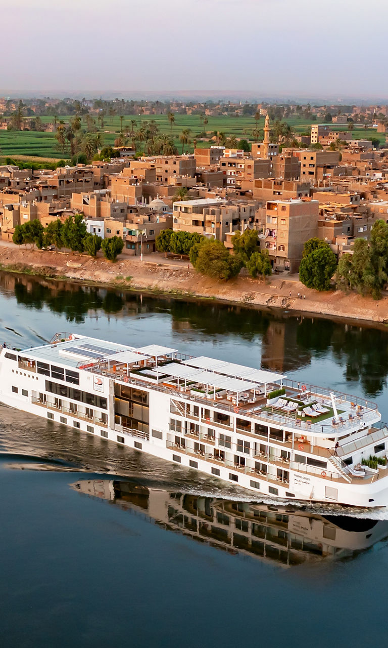 Luxury river cruise ship on calm waters