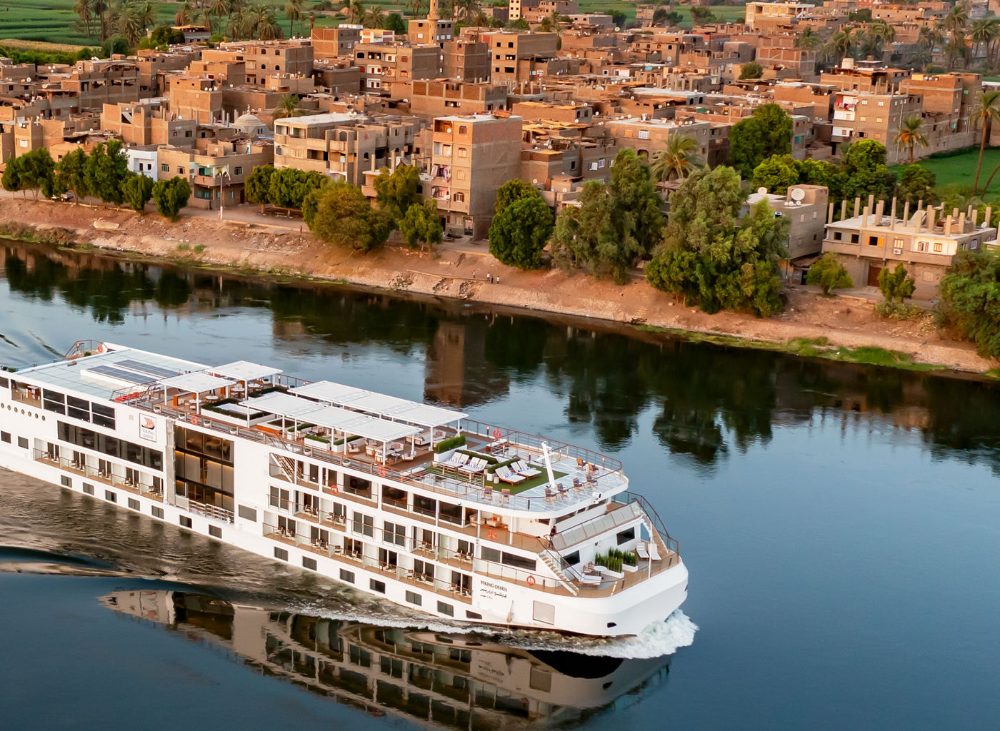 Luxury river cruise ship on calm waters