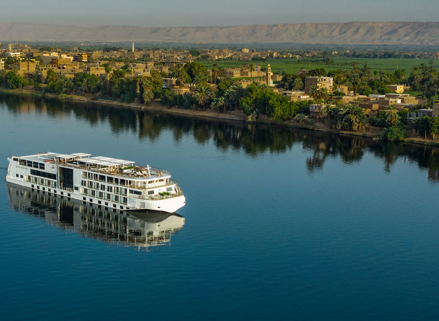 Luxury Cruise Ship on Serene River