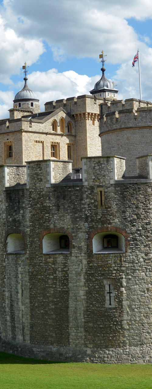 Historic Tower of London under blue skies