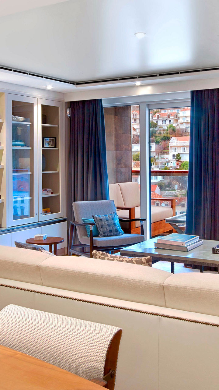 Modern living room with chessboard and balcony view