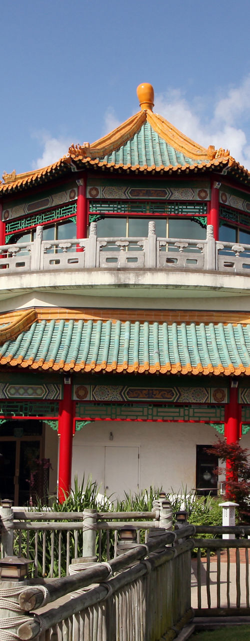 Traditional Chinese pavilion in lush garden