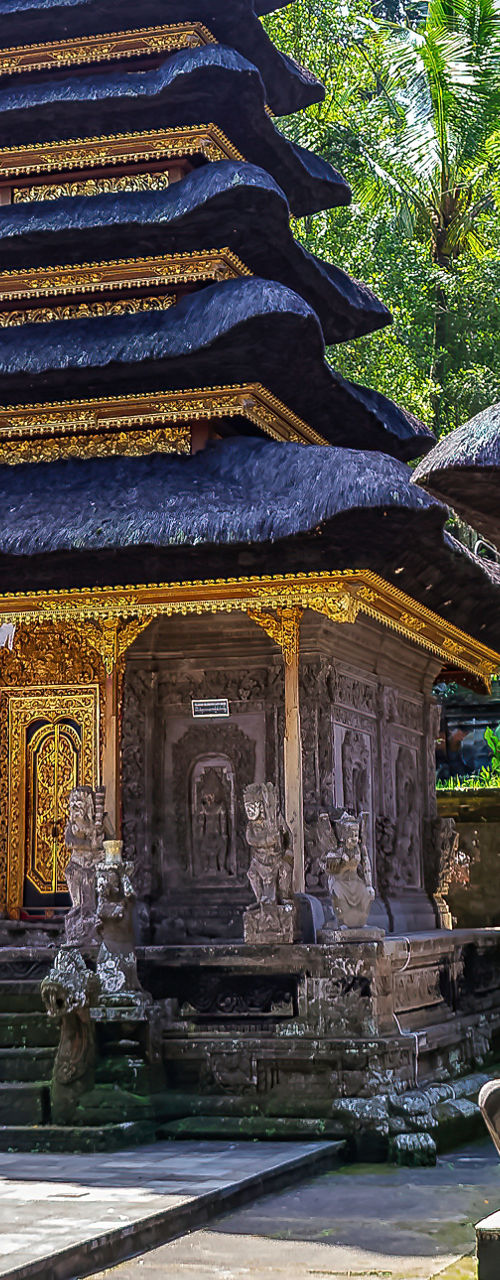 Traditional Balinese temple in lush tropical setting