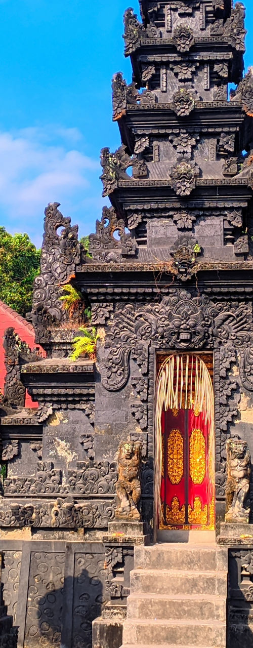 Traditional Balinese temple in lush greenery