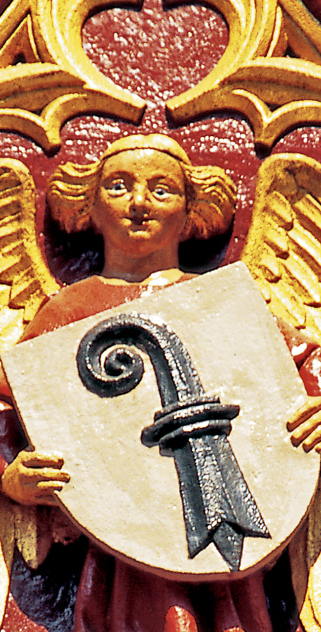 Ornate medieval fountain sculpture detail