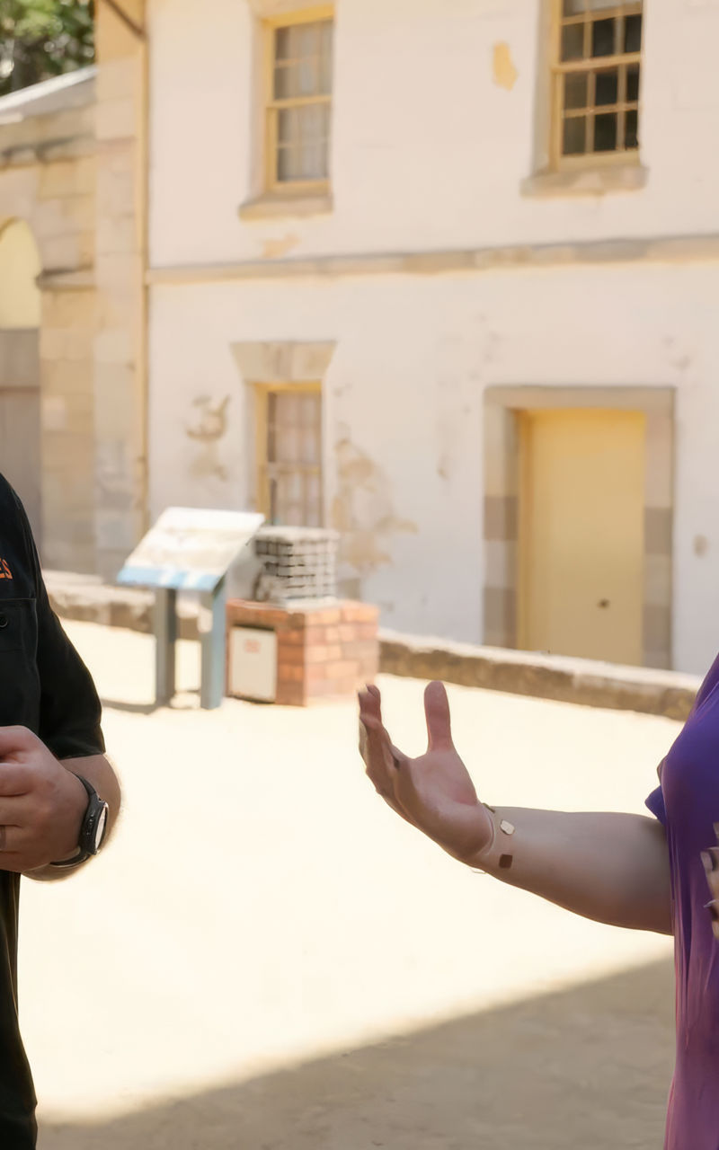 Outdoor conversation near historic building