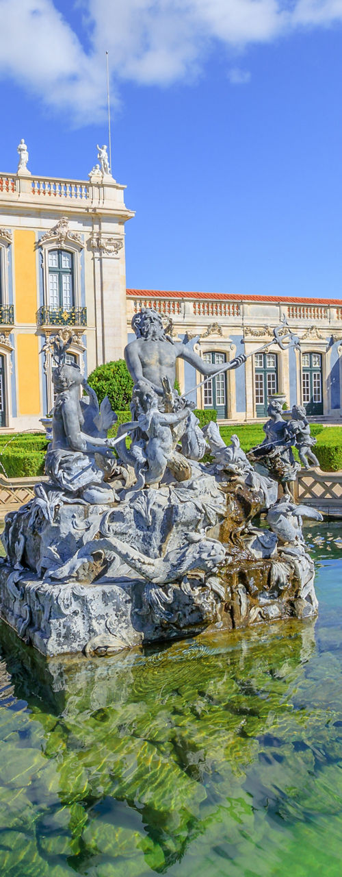 Baroque palace courtyard with ornate fountain