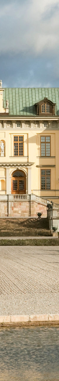 Drottningholm Palace with ornate fountain view