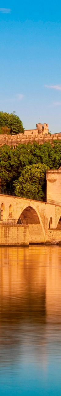Historic Stone Bridge Over Calm River