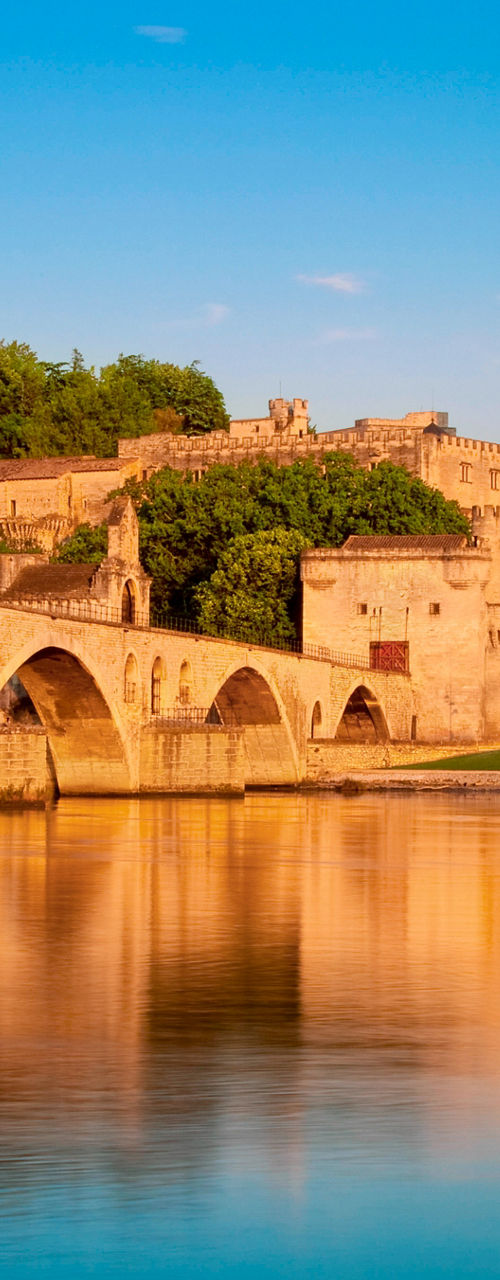 Historic Stone Bridge Over Calm River