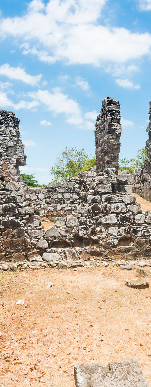 Ancient stone ruins under bright blue sky