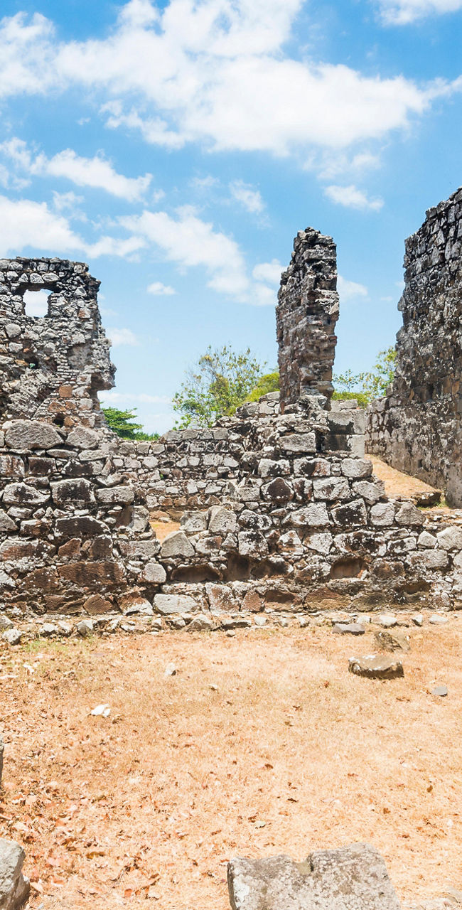Ancient stone ruins under bright blue sky