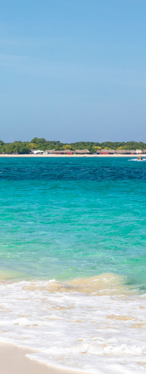 Traditional wooden boat on tropical beach