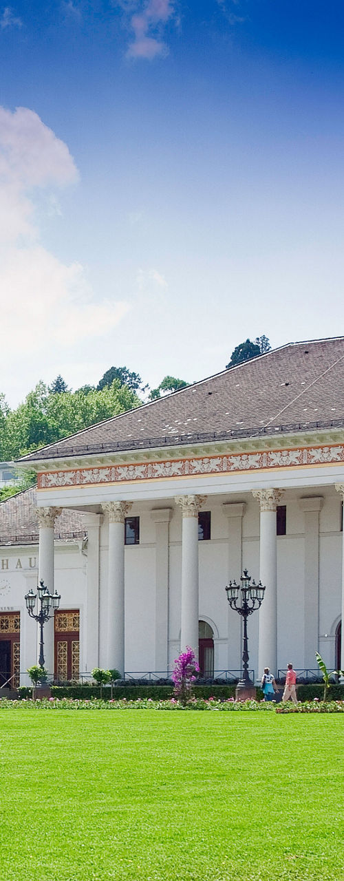 Elegant building with international flags outdoors