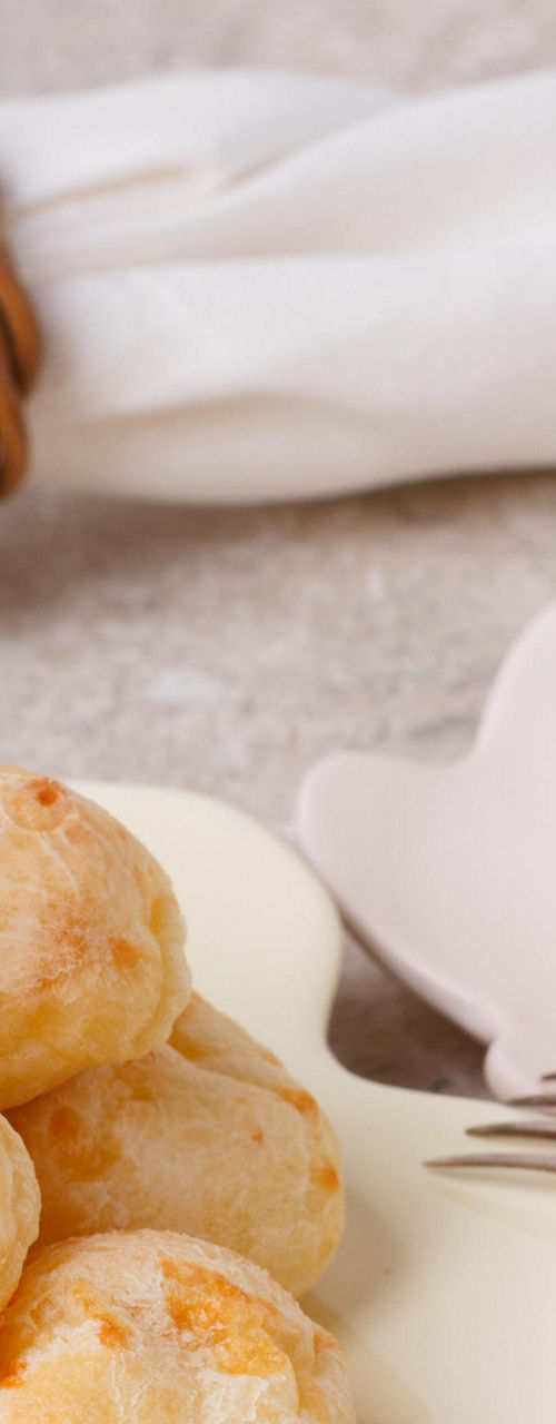 Cheese bread with coffee on table