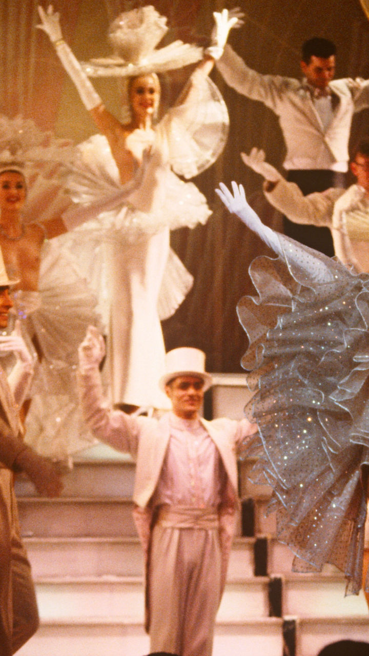 Elegant Stage Performance with Dancers