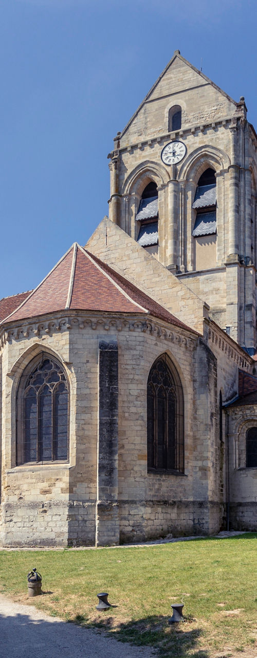 Historic stone church in sunny village square